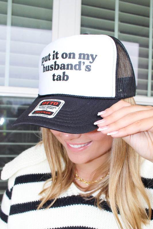 put it on my husbands tab- Trucker Hat